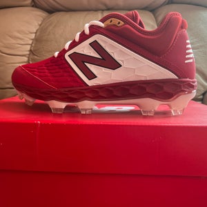 Molded mens red New Balance Baseball spikes