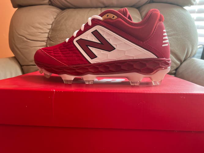 Molded mens red New Balance Baseball spikes