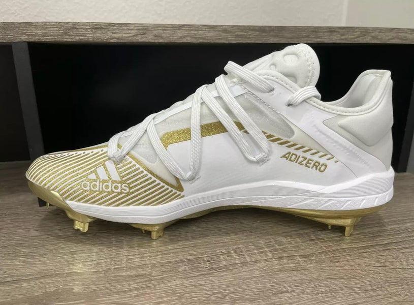 White and gold metal on sale cleats