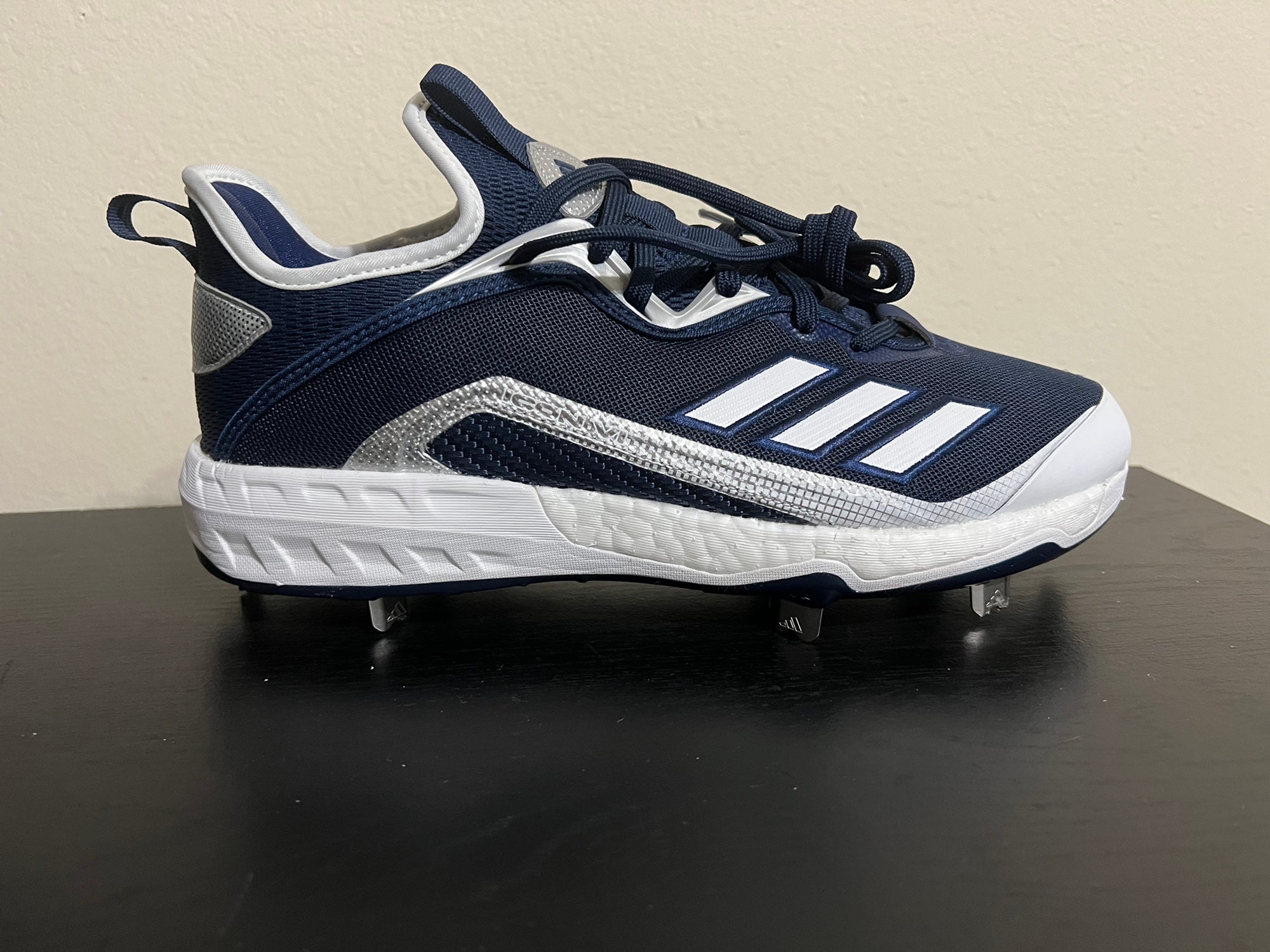 Navy blue adidas store baseball cleats