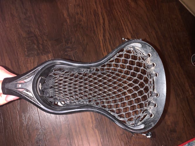 Used black stringking head