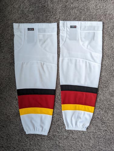 New Men's Adult Large White Ice Hockey Socks with Black / Red trim and yellow pipe Made in CANADA