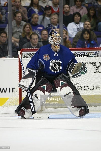 Phoenix Coyotes goalie Sean Burke game-worn catcher+blocker (2002