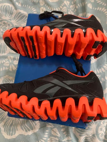 Black  and Orange Reebok New Zig Sneakers Size 3.0