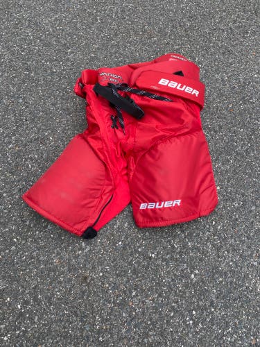Red Bauer hockey pants