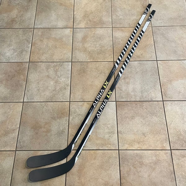 Pair of Pro Stock Warrior Alpha LXT Sticks RH W88 75 Flex