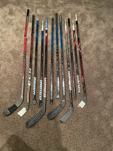 Pile Of Broken Hockey Sticks
