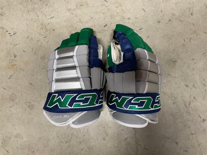 Used CCM Tacks 4 Roll Pro Gloves 14"