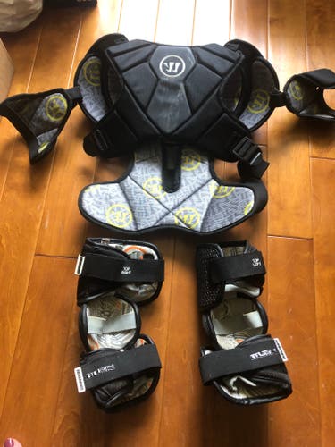 Used Medium Warrior Regulator Shoulder Pads and arm pad