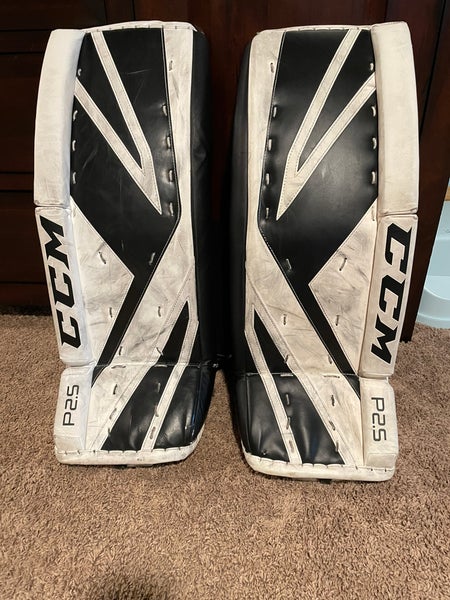 Used CCM Premier junior leg pads, plus chest and arm protector.