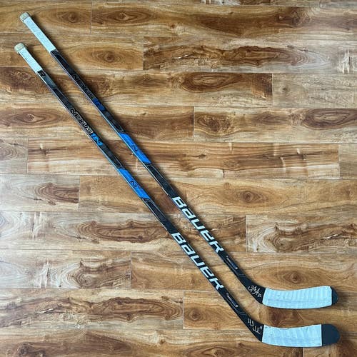 Game Used, Signed - Daniel & Henrik Sedin Hockey Sticks