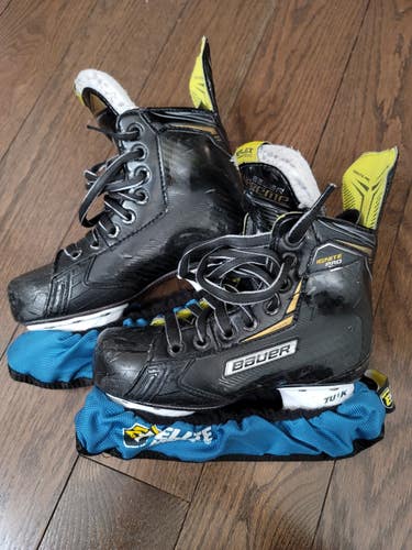 Junior Used Bauer Supreme Ignite Pro Hockey Skates Regular Width Size 1.5