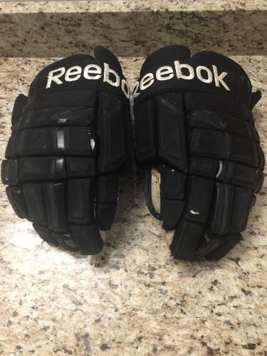 USED GAME WORN A.H.L. CLEVELAND/LAKE ERIE MONSTER GLOVES HOCKEY GLOVES