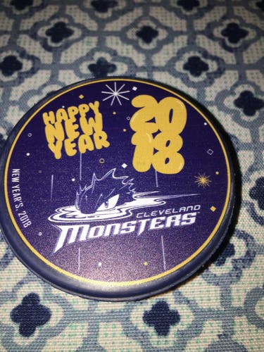 BLUE 2018 HAPPY NEW YEAR CLEVELAND MONSTERS A.H.L . HOCKEY PUCK -