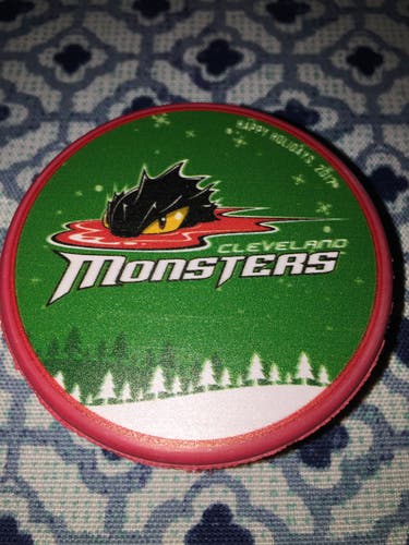RED  2017 HAPPY HOLIDAYS   CLEVELAND MONSTERS A.H.L . HOCKEY PUCK -