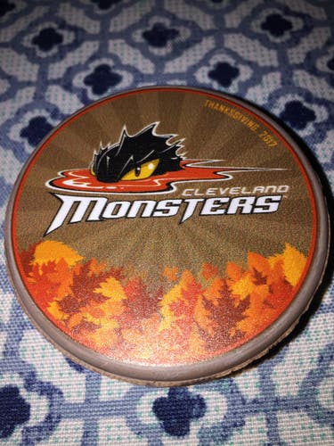 BROWN 2017 THANKSGIVING  CLEVELAND MONSTERS A.H.L . HOCKEY PUCK
