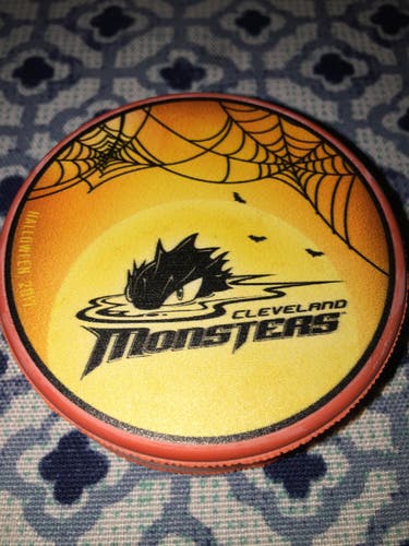 ORANGE  2017 HALLOWEEN  CLEVELAND MONSTERS A.H.L . HOCKEY PUCK