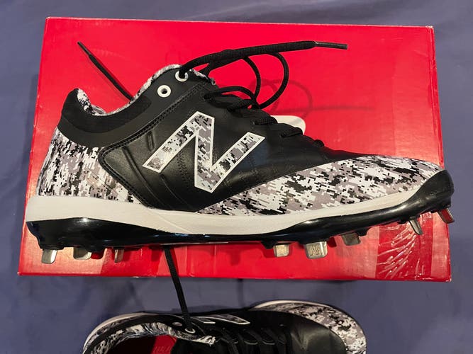 Lightly Used New Balance Metal Cleats