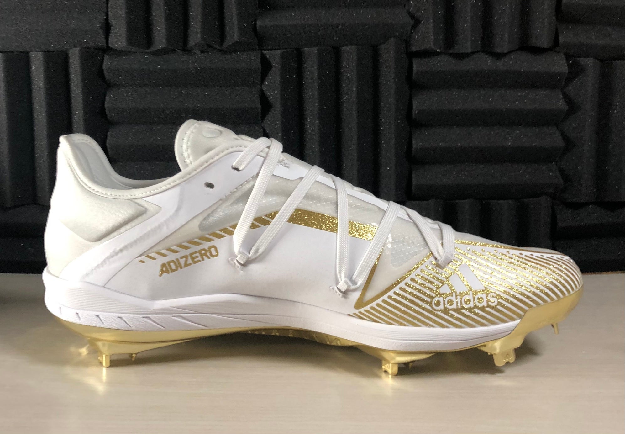 adidas gold bottom cleats