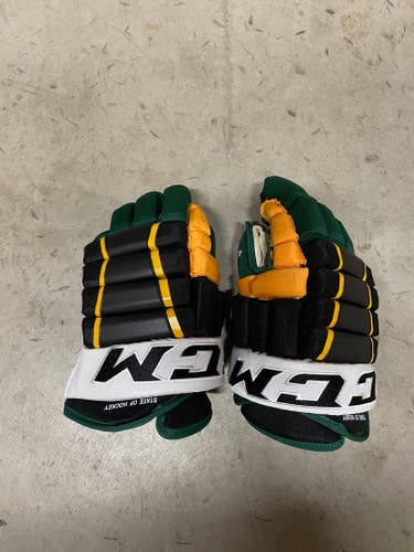 Used CCM Custom 4-roll Gloves 14"