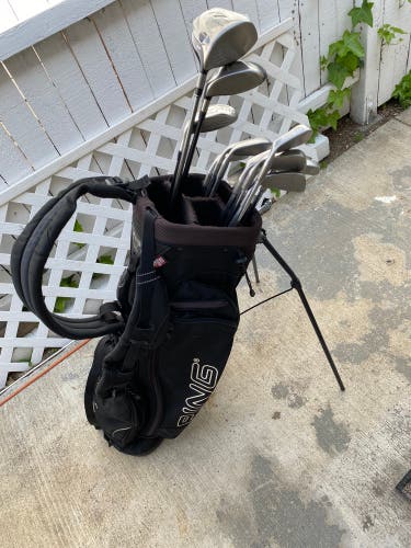Ping and Taylormade golf club set with ping stand bag