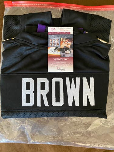 Signed and Authenticated “Hollywood” Brown Ravens Jersey.