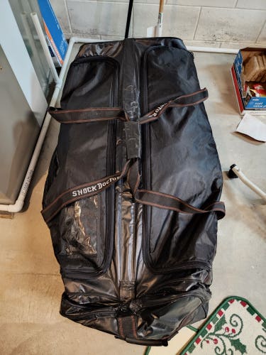 Used Shock Doctor Wheeled Hockey Bag with Dryer