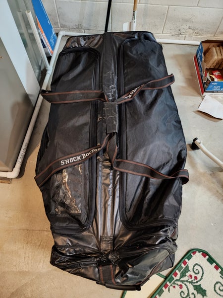 Used Shock Doctor Wheeled Hockey Bag with Dryer