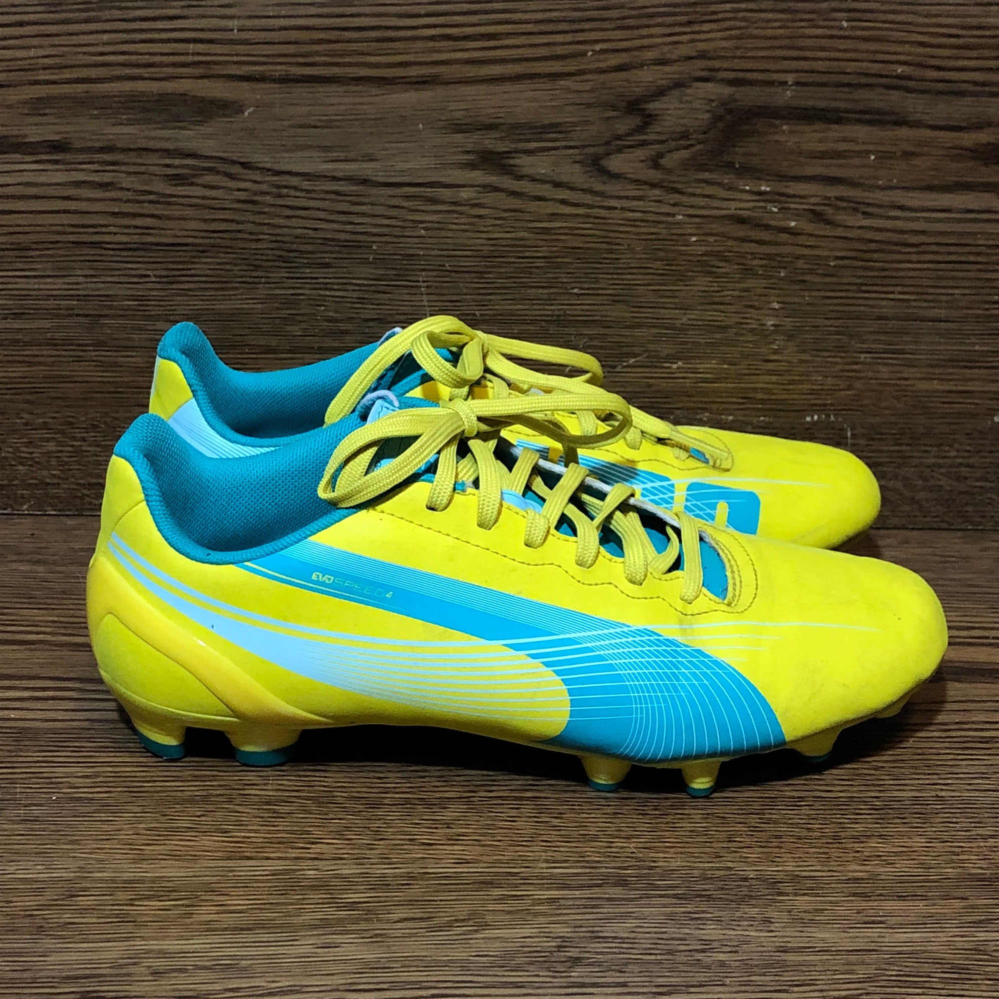 Puma evospeed 4 yellow blue FG leather soccer cleats womens size 7.5 102891  04 | SidelineSwap
