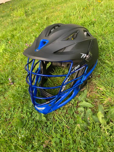 Cascade R lacrosse helmet, Matte black with chrome blue face mask.