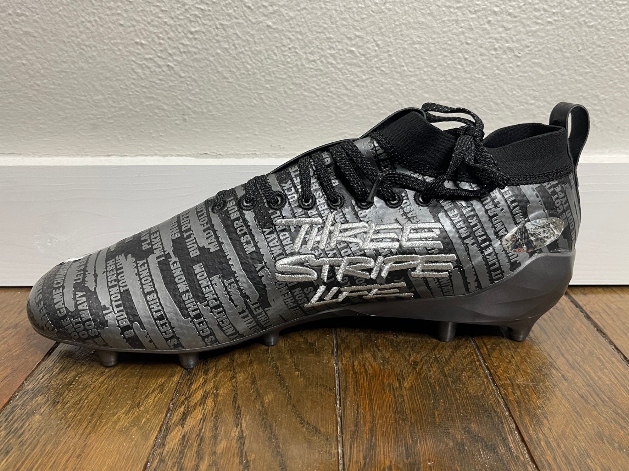 three stripe life cleats black