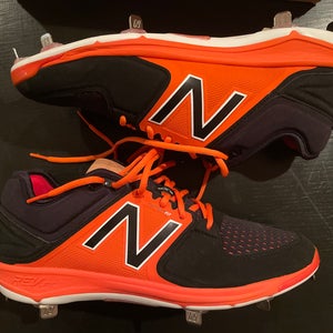 New Balance baseball cleats metal orange and black
