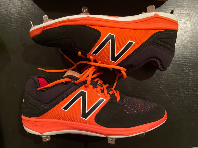 New Balance baseball cleats metal orange and black