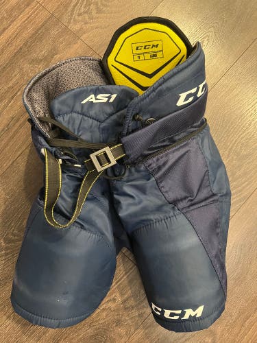 Used CCM AS1 Youth Large Hockey Pants Navy