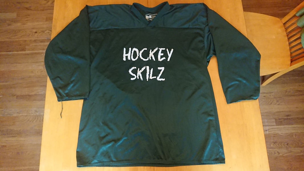 Dark green hockey practice jersey