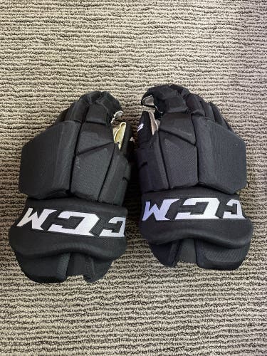 Black CCM HGTKPP Pro Stock Gloves w/shot blocker padding