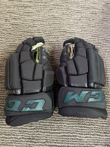 Black/Green CCM 15" Pro Stock Pro Model Gloves w/shot blocker padding