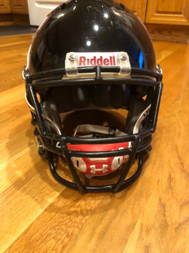 Medium riddell football helmet with under armour chin strap