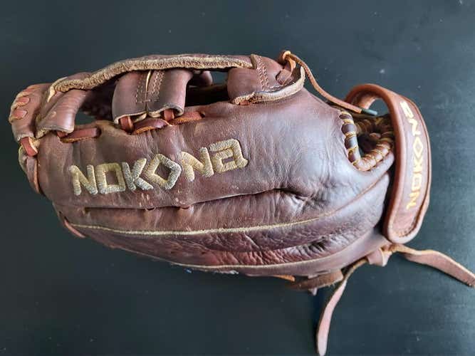 Used Right Hand Throw Nokona Infield Softball Glove 12"