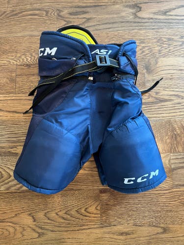 Used Youth Large CCM AS1 Hockey Pants Navy