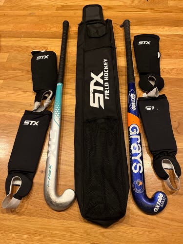 Bundle Of 2 Field Hockey Sticks, 2 Shin Pads, And 1 STX Field Hockey Bag