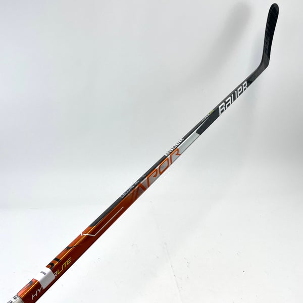 Used Left Handed Orange Bauer Vapor Hyperlite | P92M Curve | 87 Flex | Grip | #M400