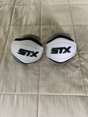 Used Medium STX Cell IV Elbow Caps