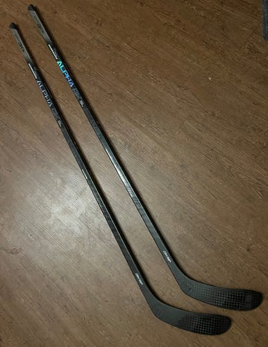 2-Pack of Used Senior Warrior Right Handed 75 Flex Alpha DX SL Hockey Sticks P28