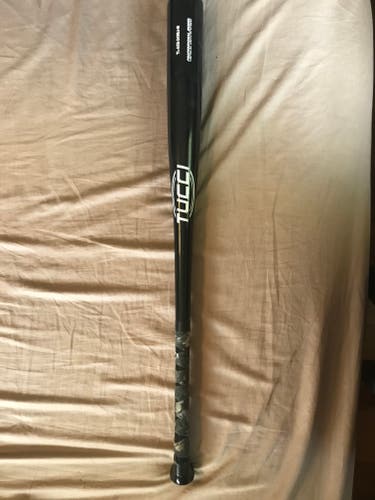 Used Tucci Wood Bat 31.5 oz 34" AXE Handle