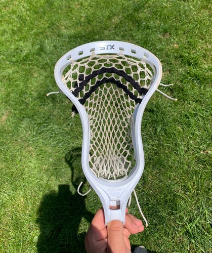 STX Stallion U 550 Lacrosse head - White head with Hero 3.0 mesh.