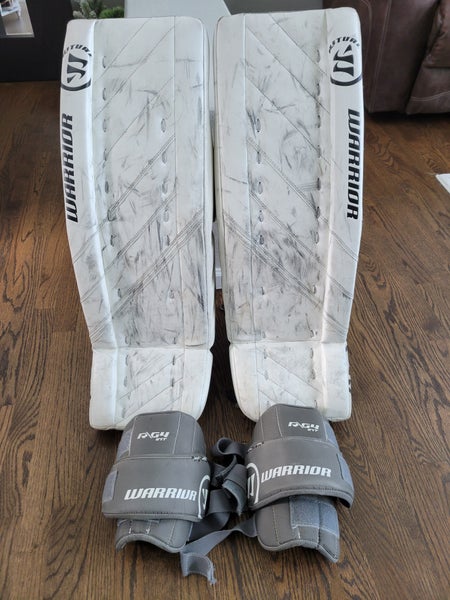 Used 32" Warrior Ritual G4 Goalie Leg Pads