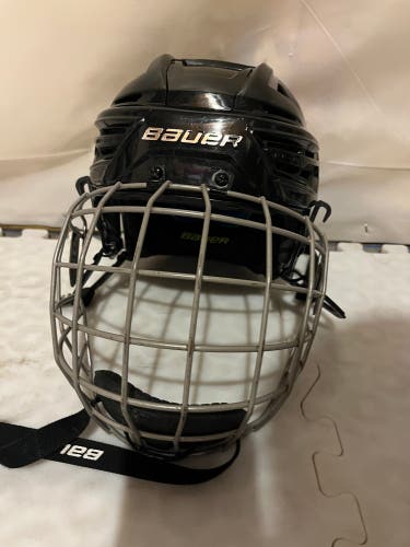 Used Medium Bauer  Re-Akt 150 Helmet