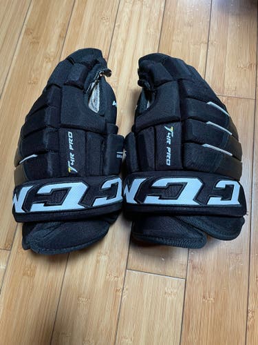 Used CCM Tacks 4 Roll Pro Gloves 14"