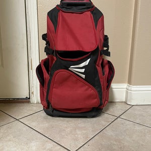 Red rolling softball bag